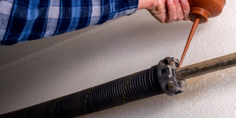 How Do You Tension Your Roll-Up Garage Door Springs?